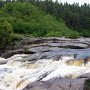 <p align=left>Port-Cartier, à quelques pas du camping Le Paradis: rivière Dominique